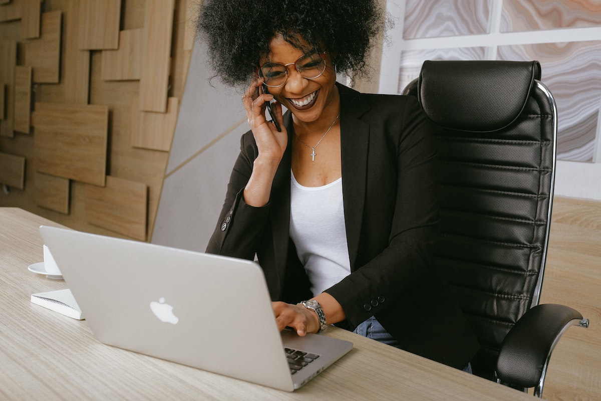 Buying agent on the phone, working hard for her clients in a hot housing market